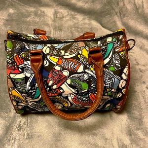 All over sneaker/tennis shoe print handbag.